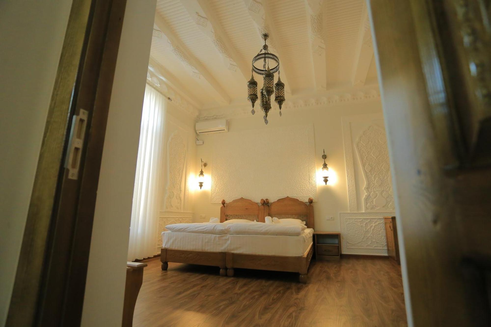 Guesthouse Muqaddam 布哈拉 外观 照片