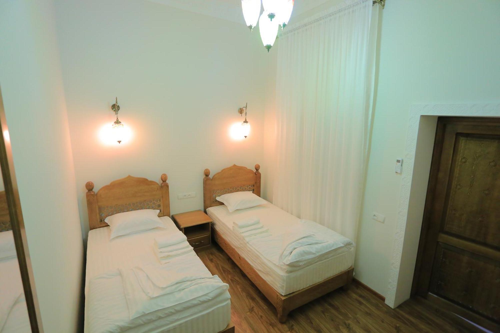 Guesthouse Muqaddam 布哈拉 外观 照片